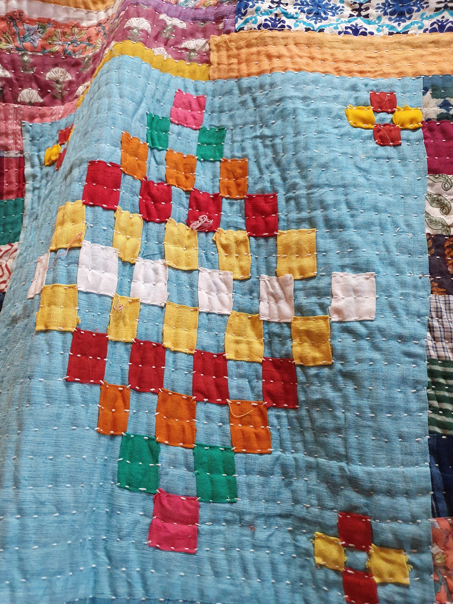 Handcrafted Siddi quilt with Blue Cross