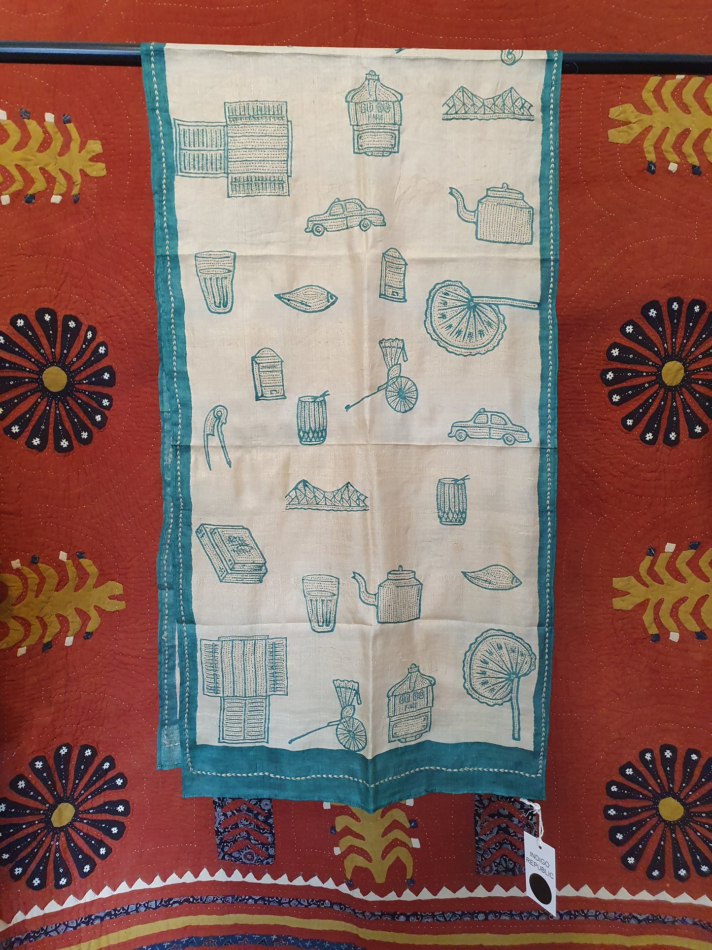 Silk scarf in cream with green motifs