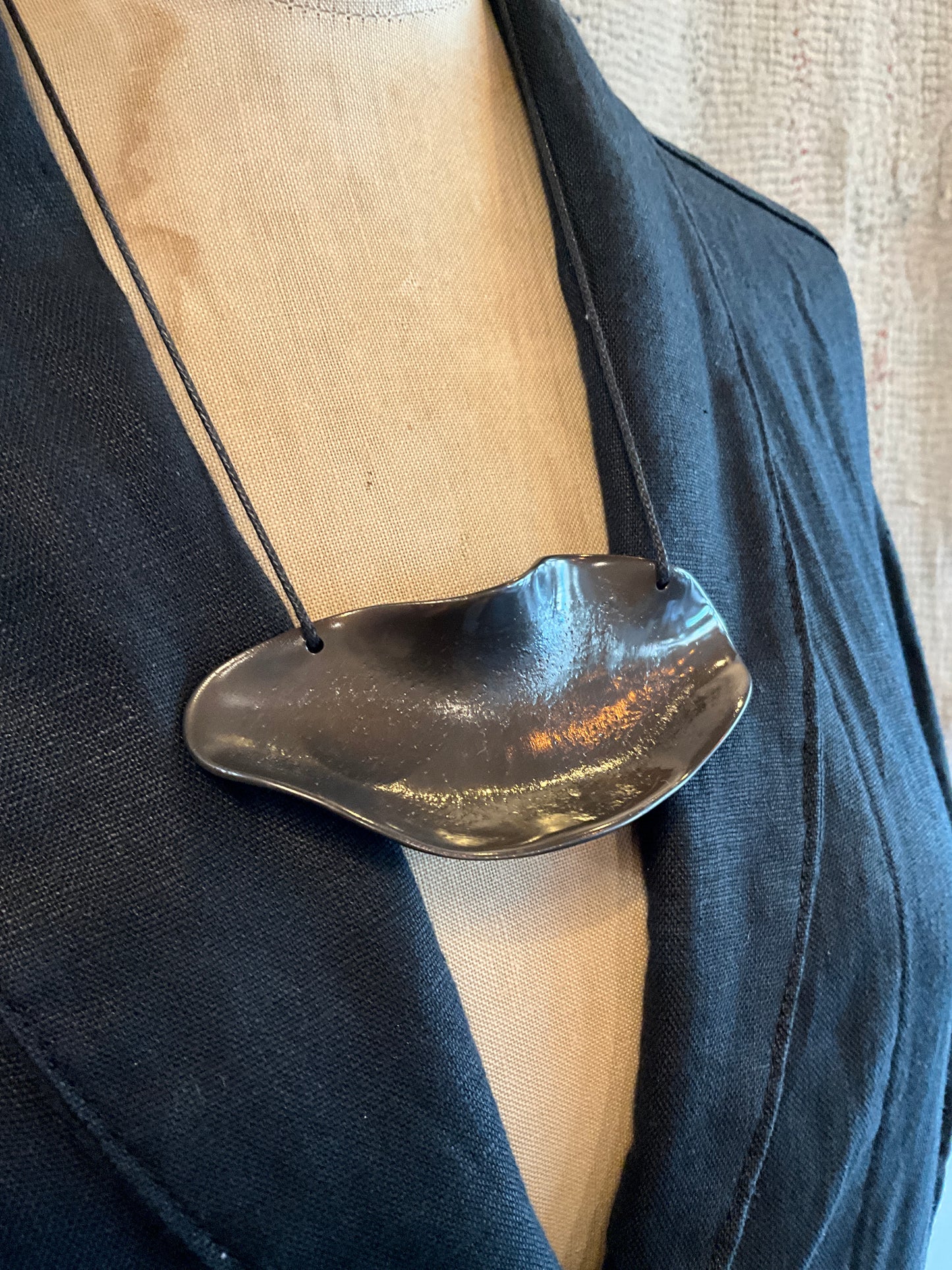 Sand casted brass neck piece with espresso finish