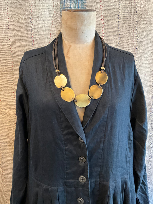 Brass neck piece with discs