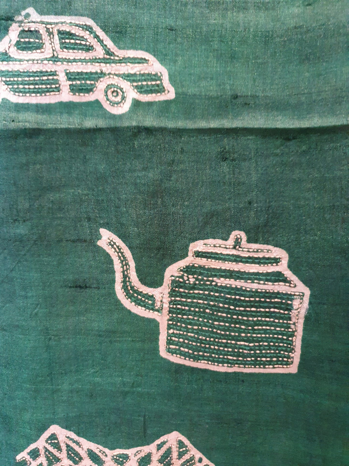 Silk scarf in emerald green with motifs