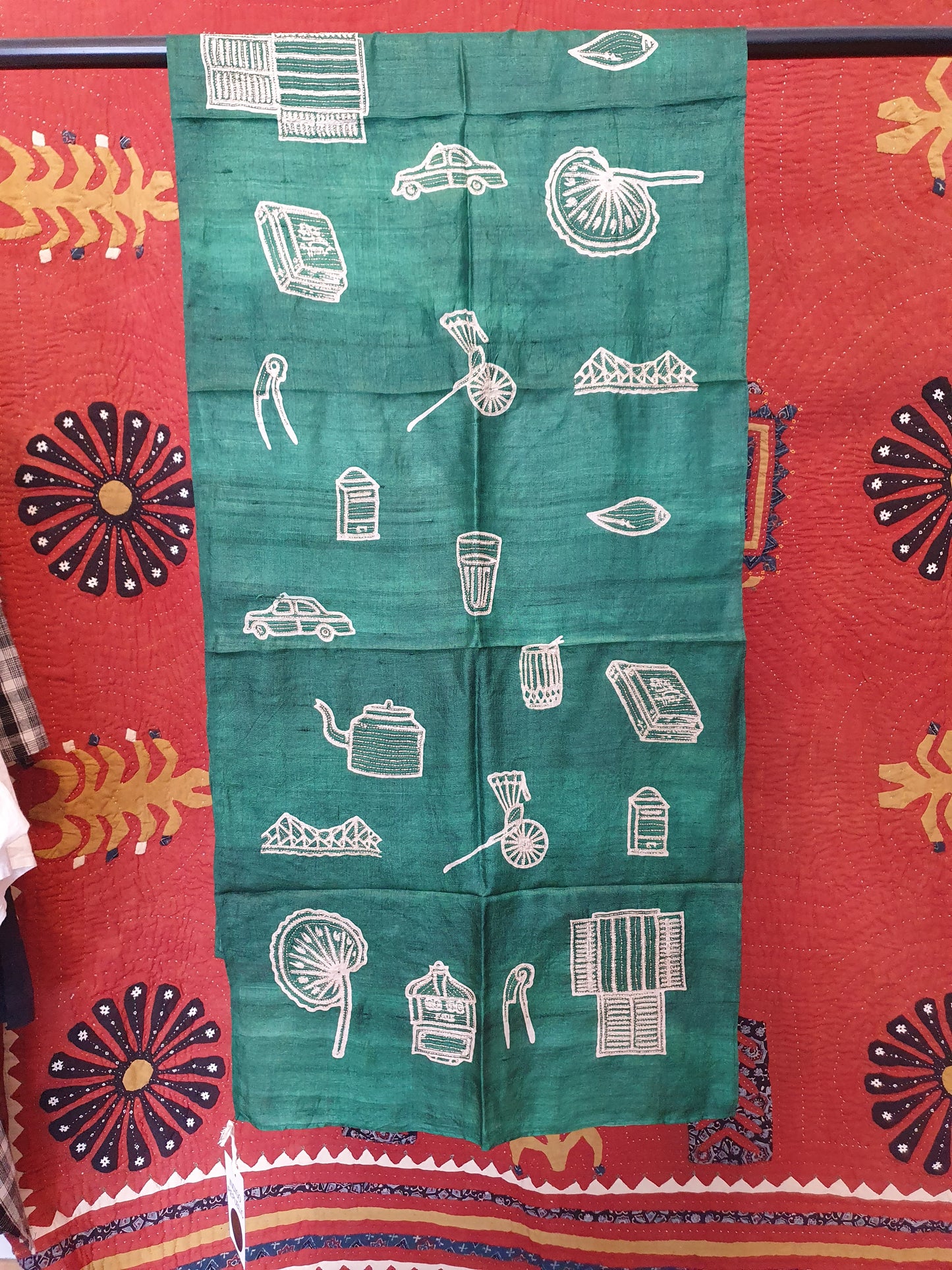 Silk scarf in emerald green with motifs