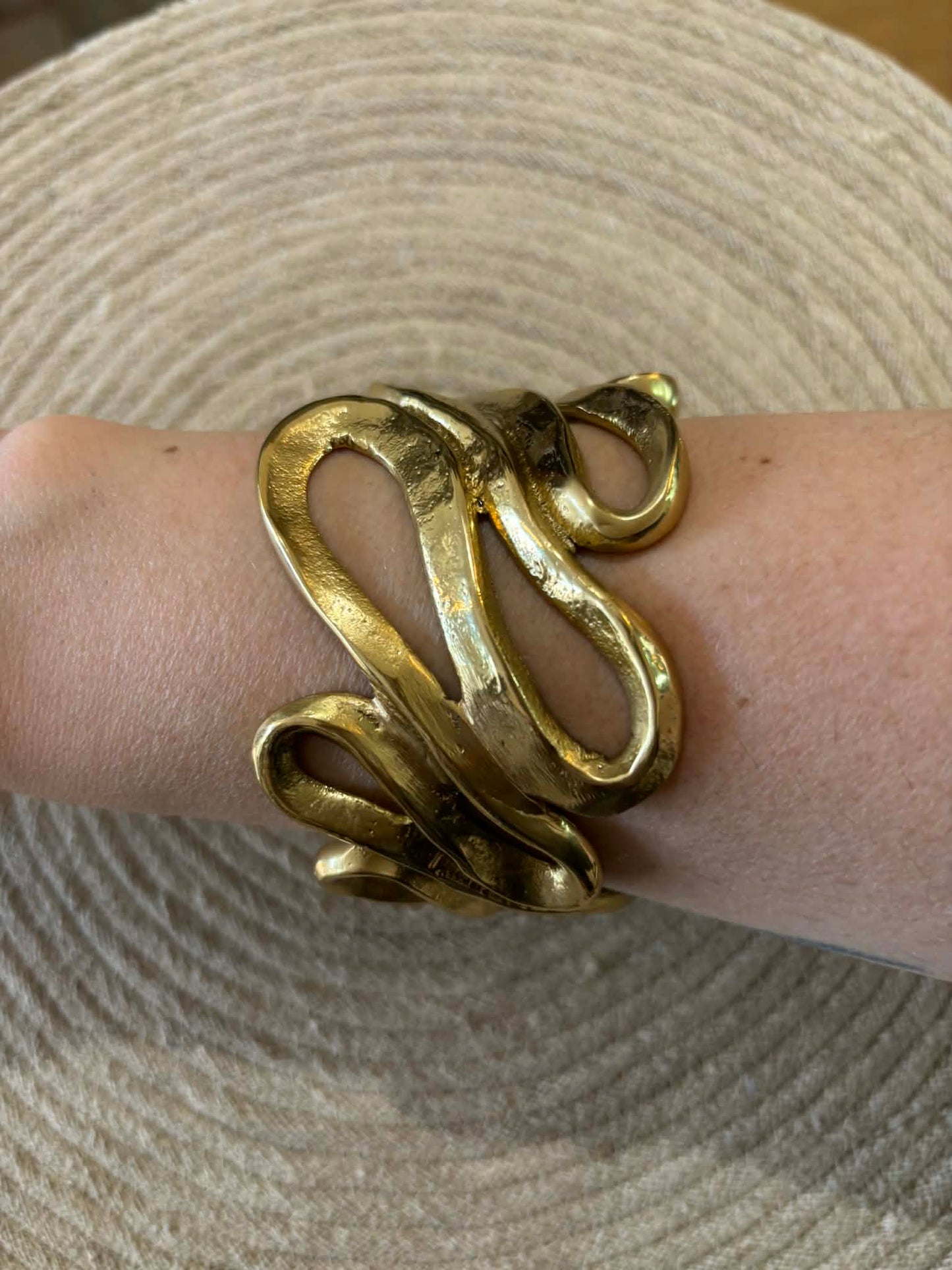 Large brass ribbon cuff
