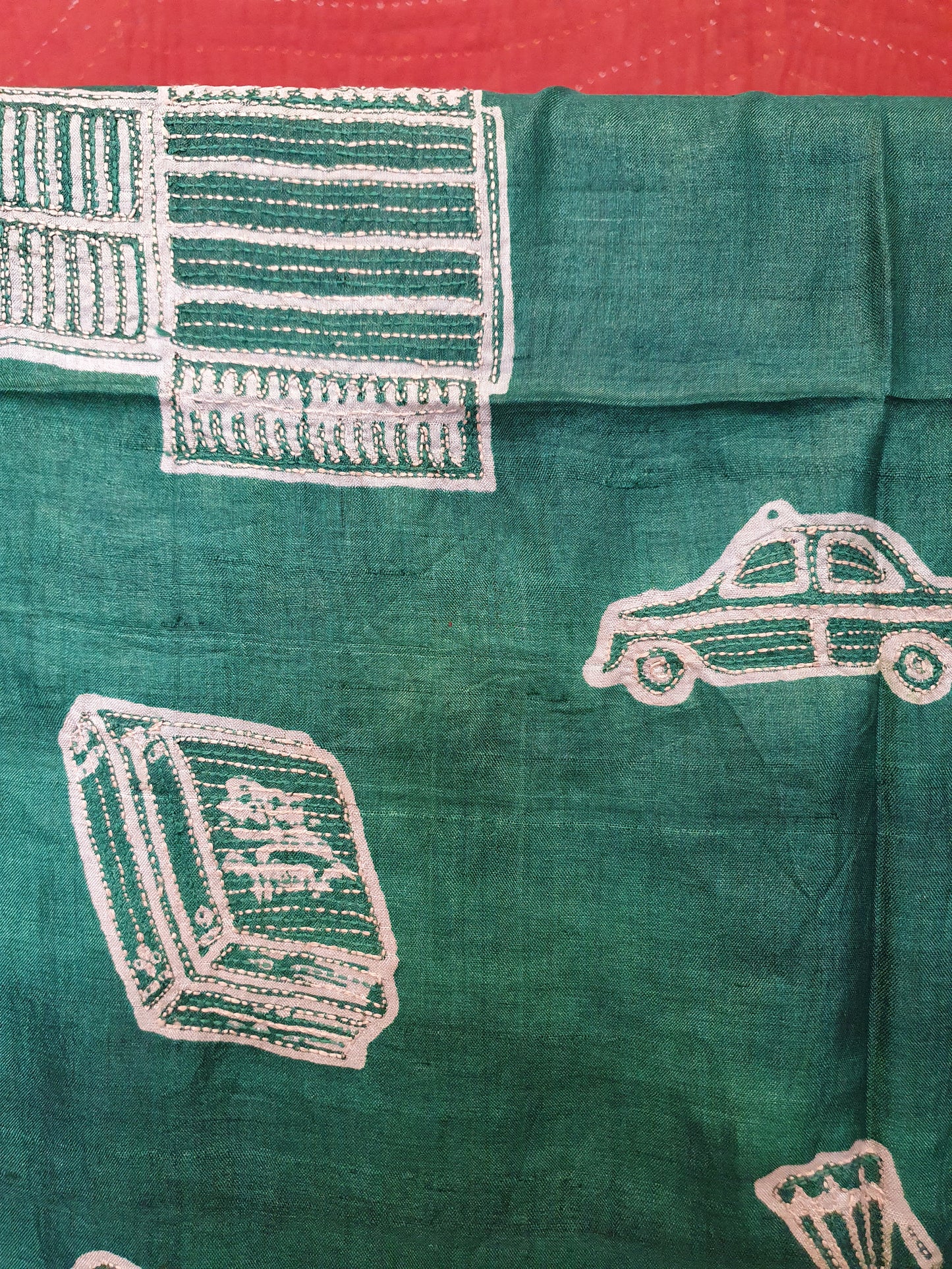 Silk scarf in emerald green with motifs